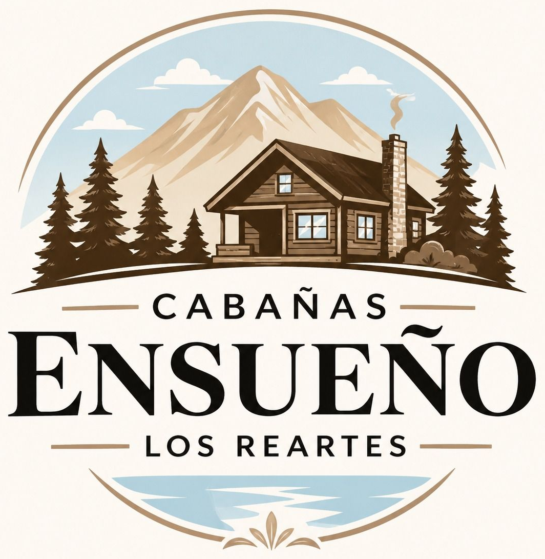 Logo de Cabañas Ensueño Los Reartes con cabaña, montañas, pinos y cielo azul circular