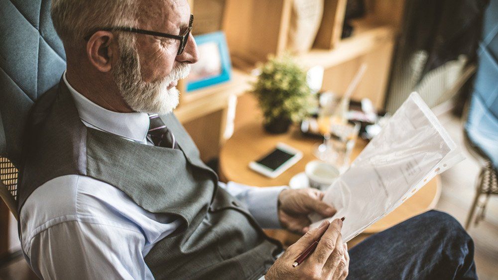 Business Man Signing Documents — Summerville, SC — Shepherd Law Firm, LLC