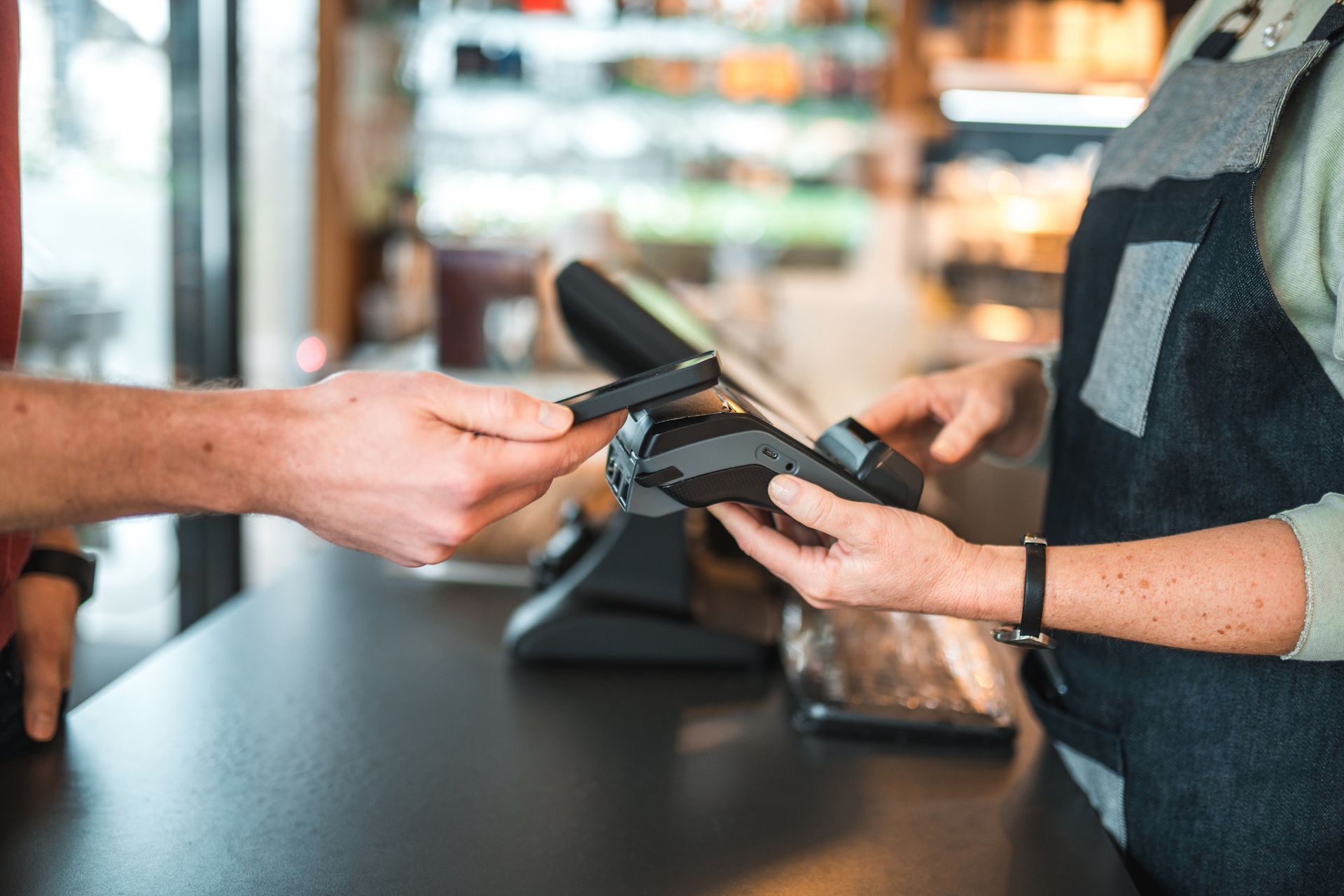 Man Using Credit Card To Pay - Cumberland, MD - MBS Keystone