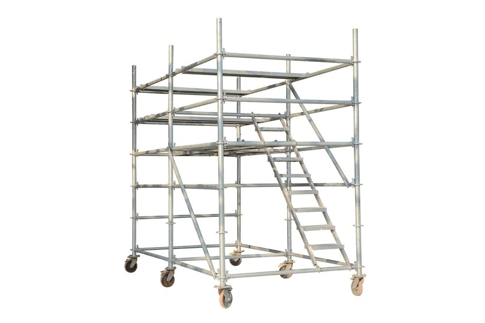 A Metal Scaffolding With Wheels And Stairs — Fahlstrom Scaffolding Cairns Pty Ltd in Gordonvale, QLD