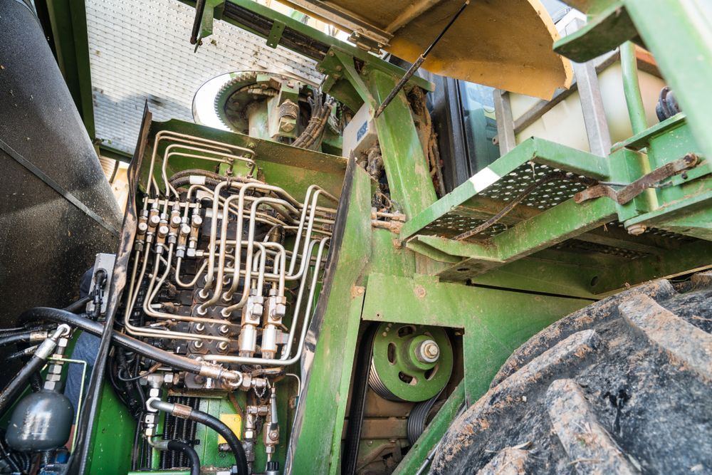 The Inside of a Green Tractor With the Hood Open — Stockers & Partridge In Dungog, NSW