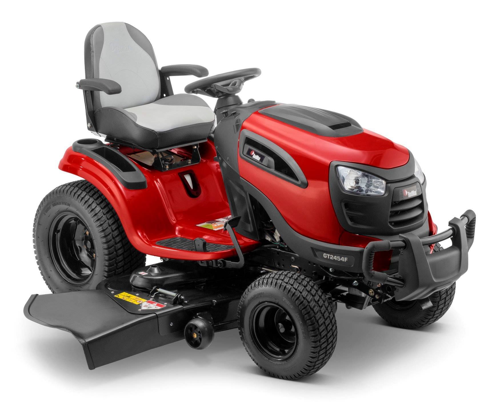 A Red Lawn Mower With a Gray Seat on a White Background — Stockers & Partridge In Paterson, NSW