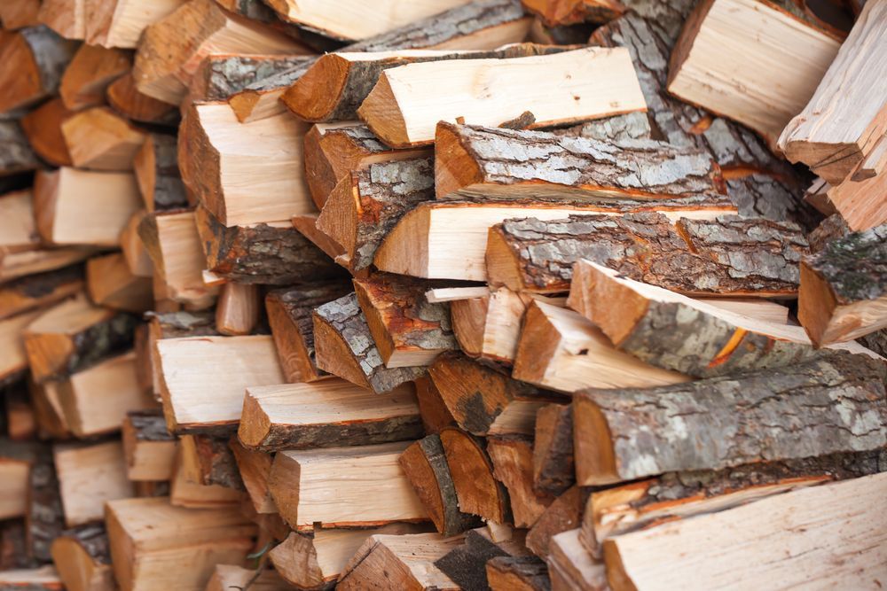 A Pile of Logs is Stacked on Top of Each Other — Stockers & Partridge In Raymond Terrace, NSW