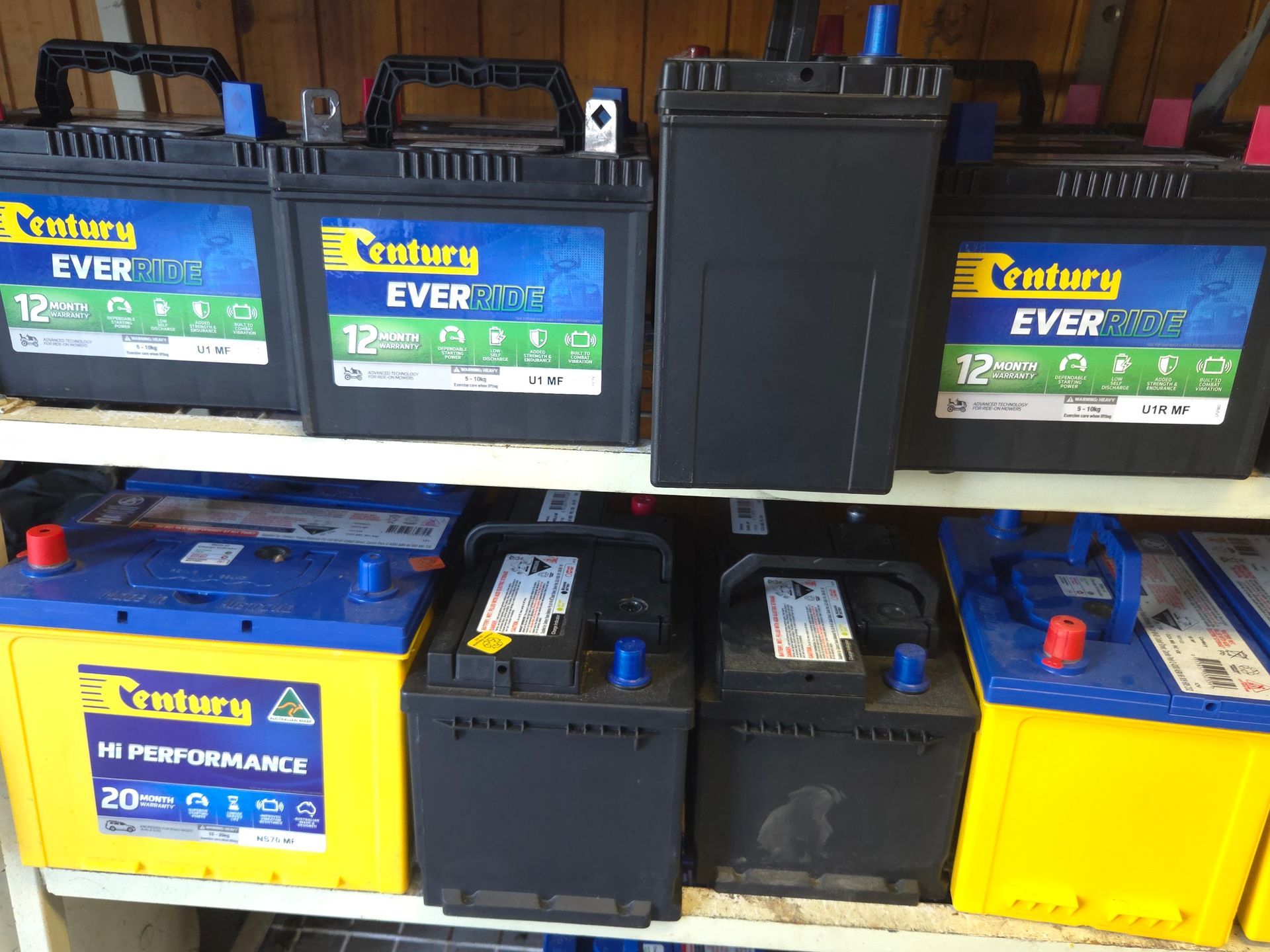 A Shelf Filled With Many Different Types of Batteries — Stockers & Partridge In Paterson, NSW