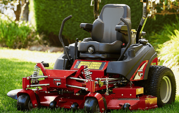 Yellow Zero-turn Lawn Mower on Green Grass — Stockers & Partridge In Maitland, NSW