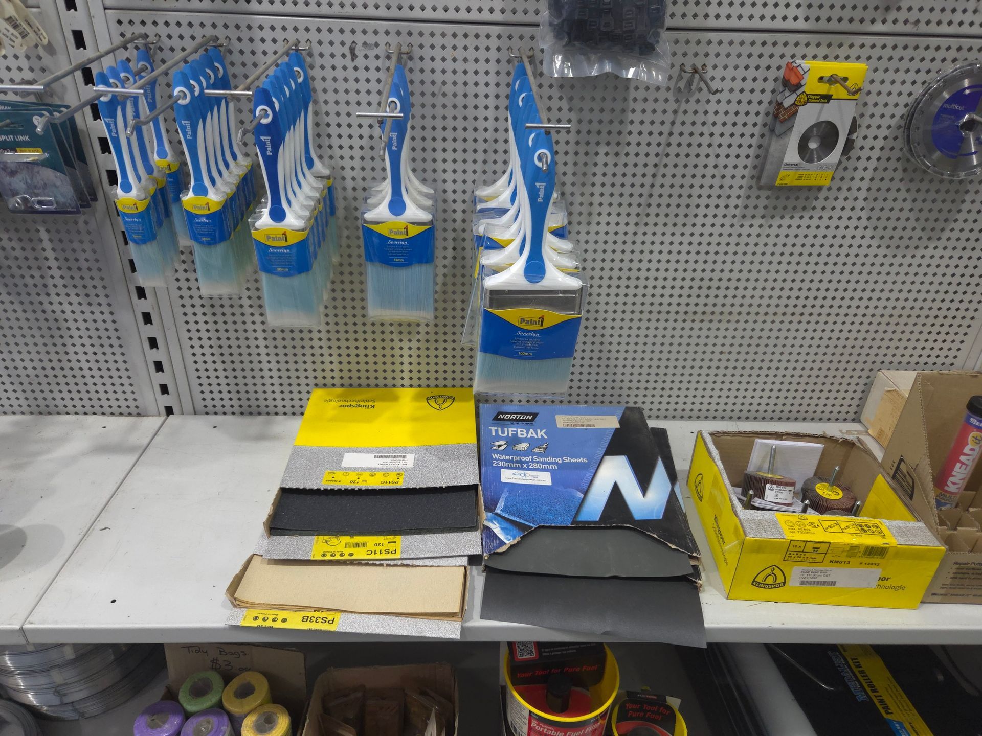 A Shelf in a Store Filled With Tools and Brushes — Stockers & Partridge In Paterson, NSW