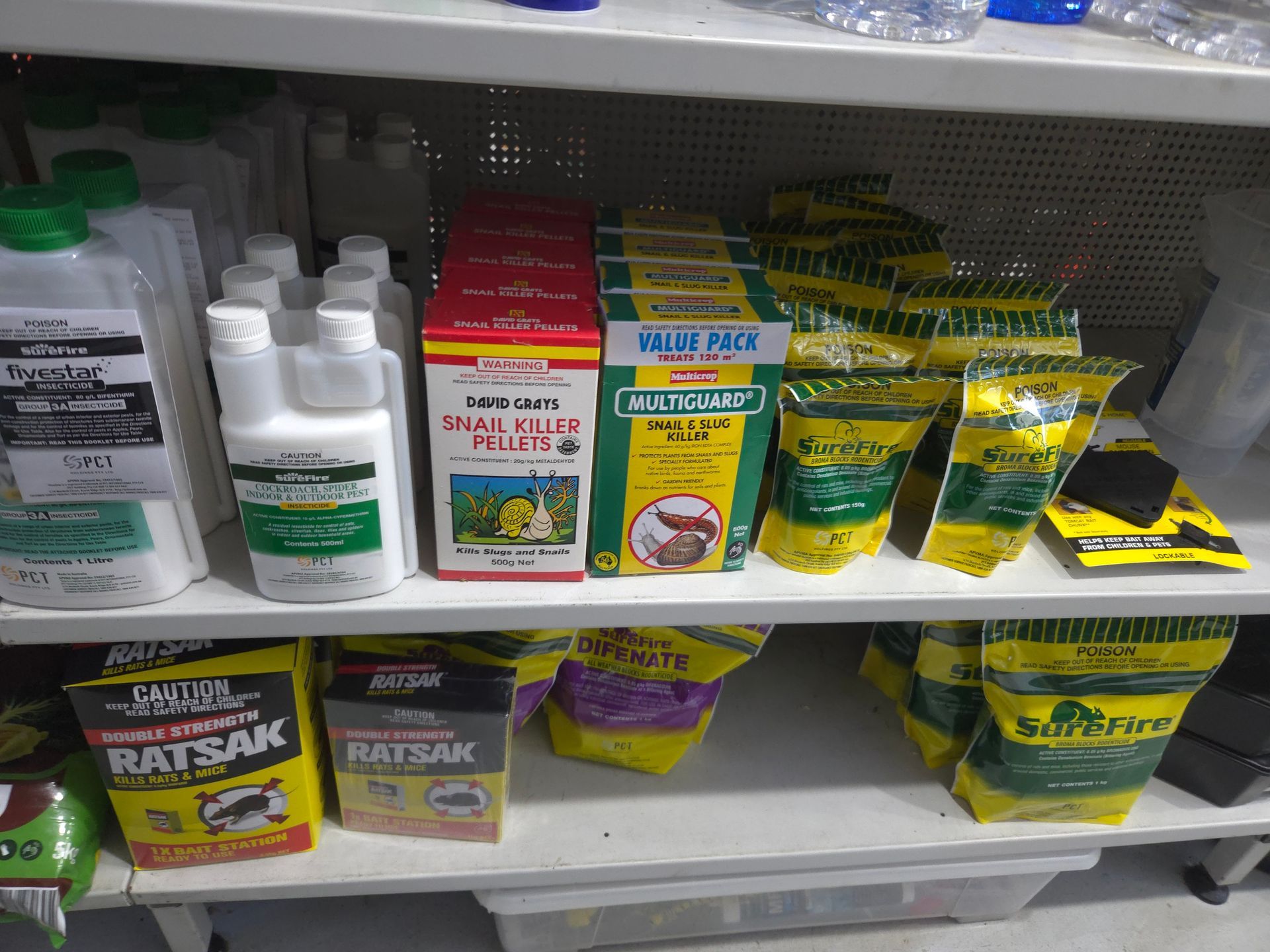 A Shelf Filled With Lots of Different Types of Rat Killers — Stockers & Partridge In Paterson, NSW