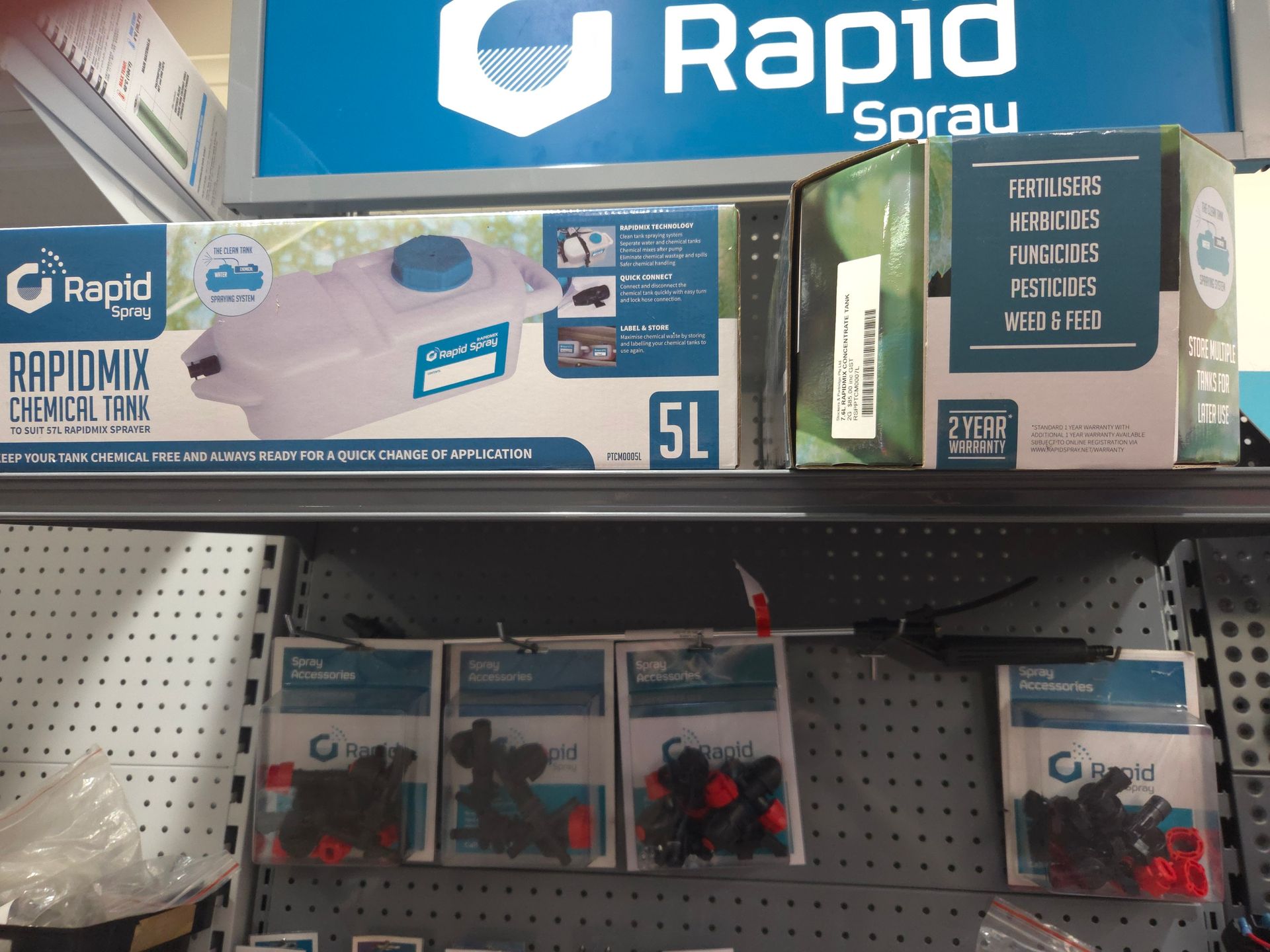A Shelf With Rapid Spray Products on It — Stockers & Partridge In Paterson, NSW