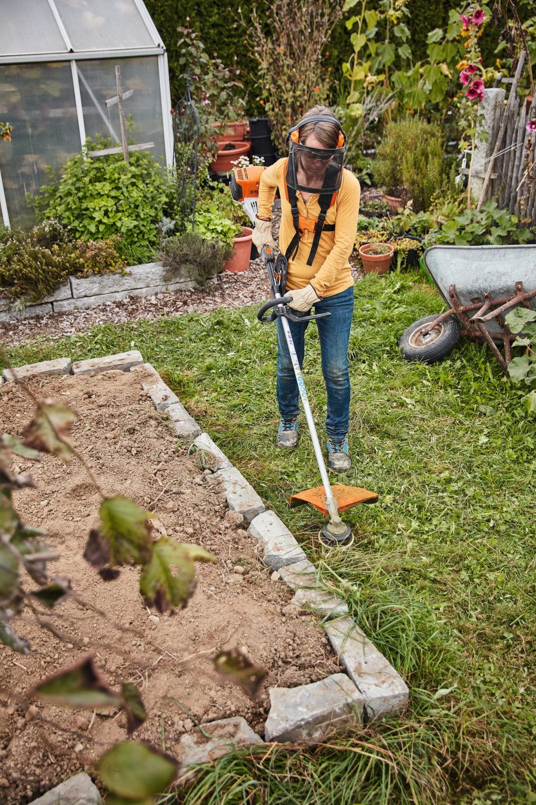 A Chainsaw is Sitting on Top of a Log — Stockers & Partridge In Paterson, NSW