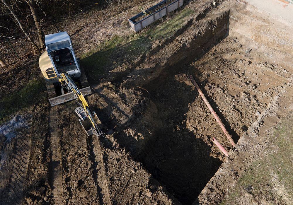ool demolition Phoenix project using rock hammer for hard digs
