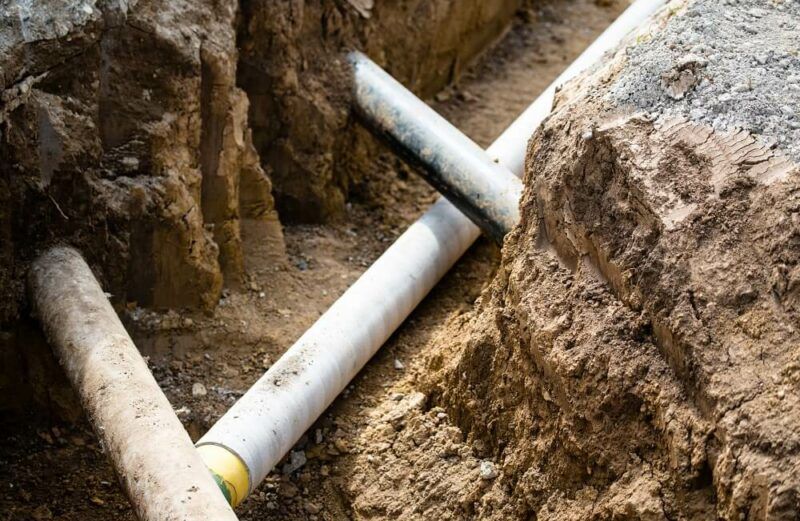 Air vacuum excavation uncovering copper water service line