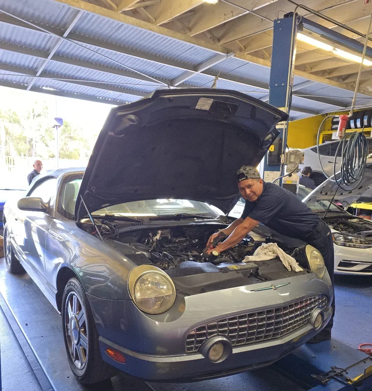 Mechanic working on a car | Carotech Automotive