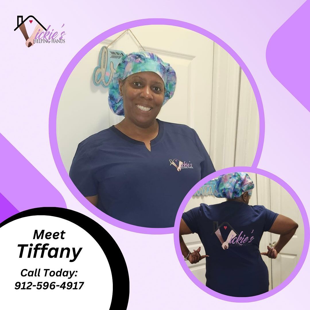 Woman in blue scrubs and floral cap, posing. Logo: 