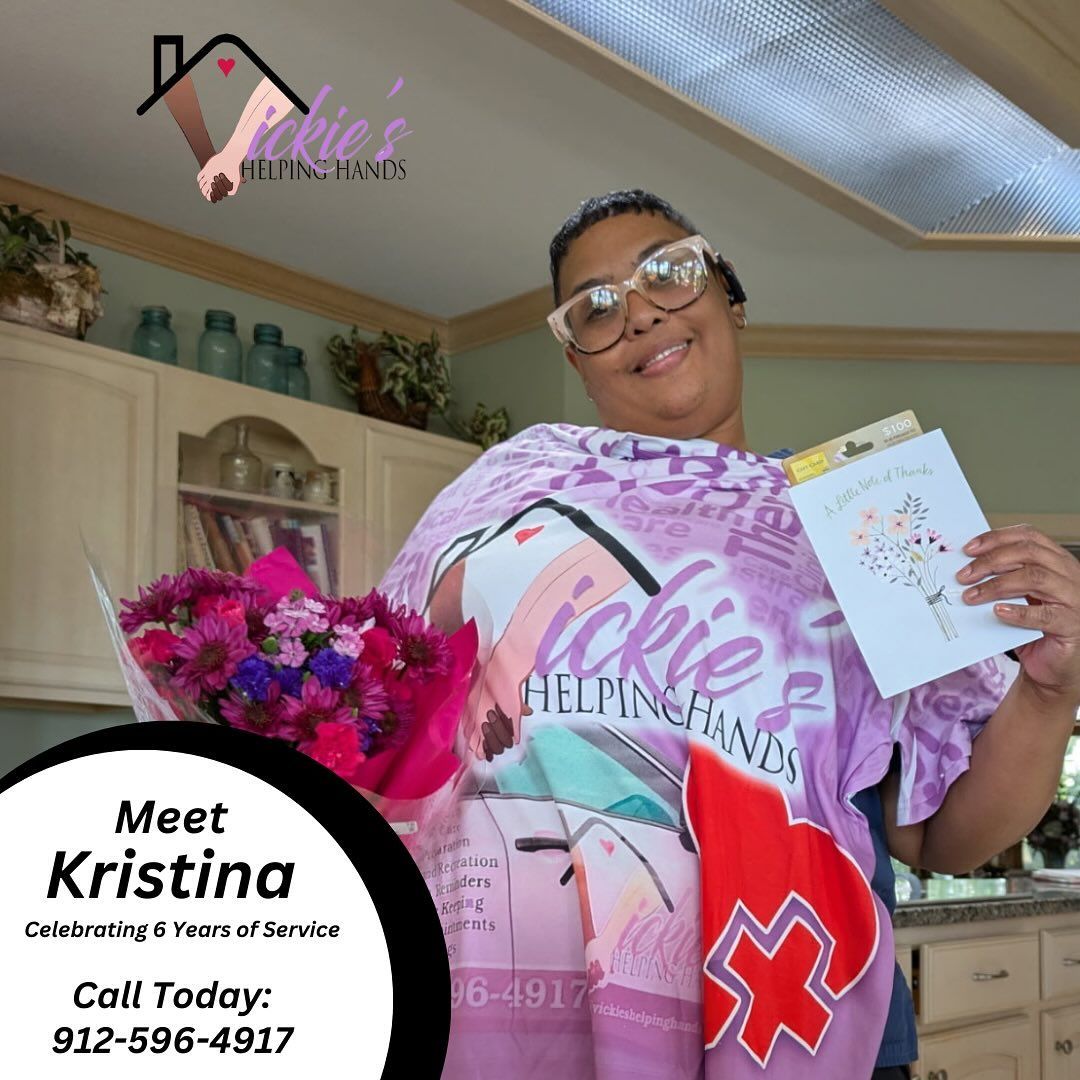 Woman with flowers and card, celebrating years of service for 