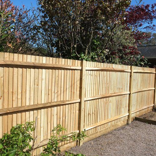 Brand new wooden shiplap boundary fence