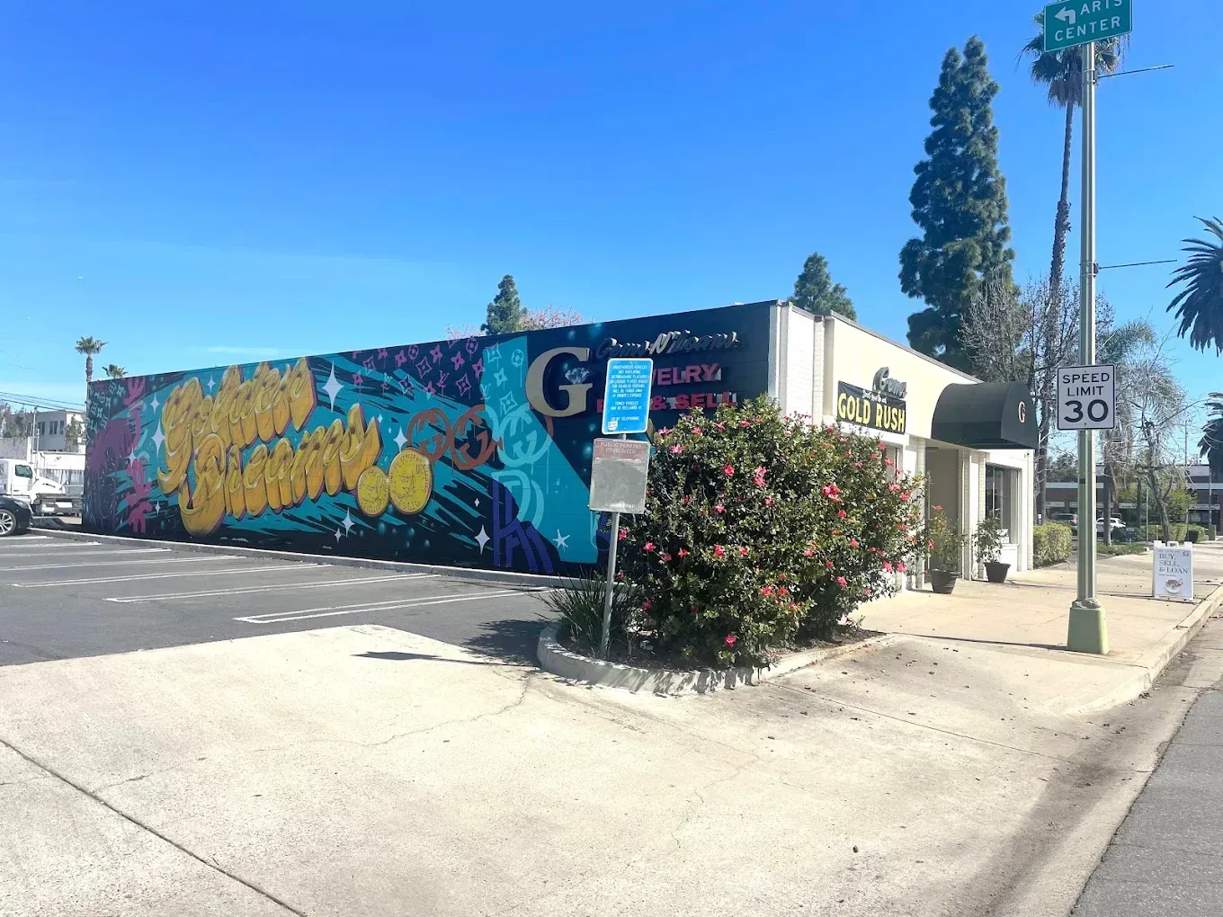 A building with a large mural on the side of it
