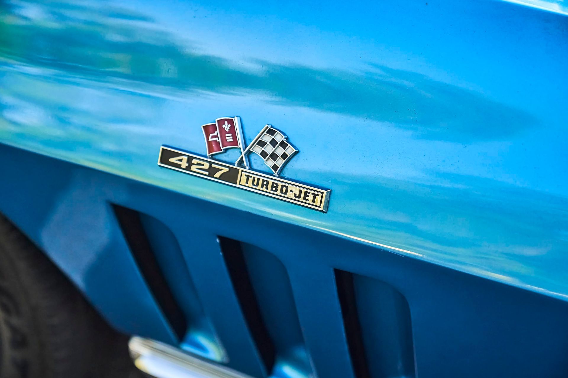 Blue classic Chevrolet Corvette side panel with