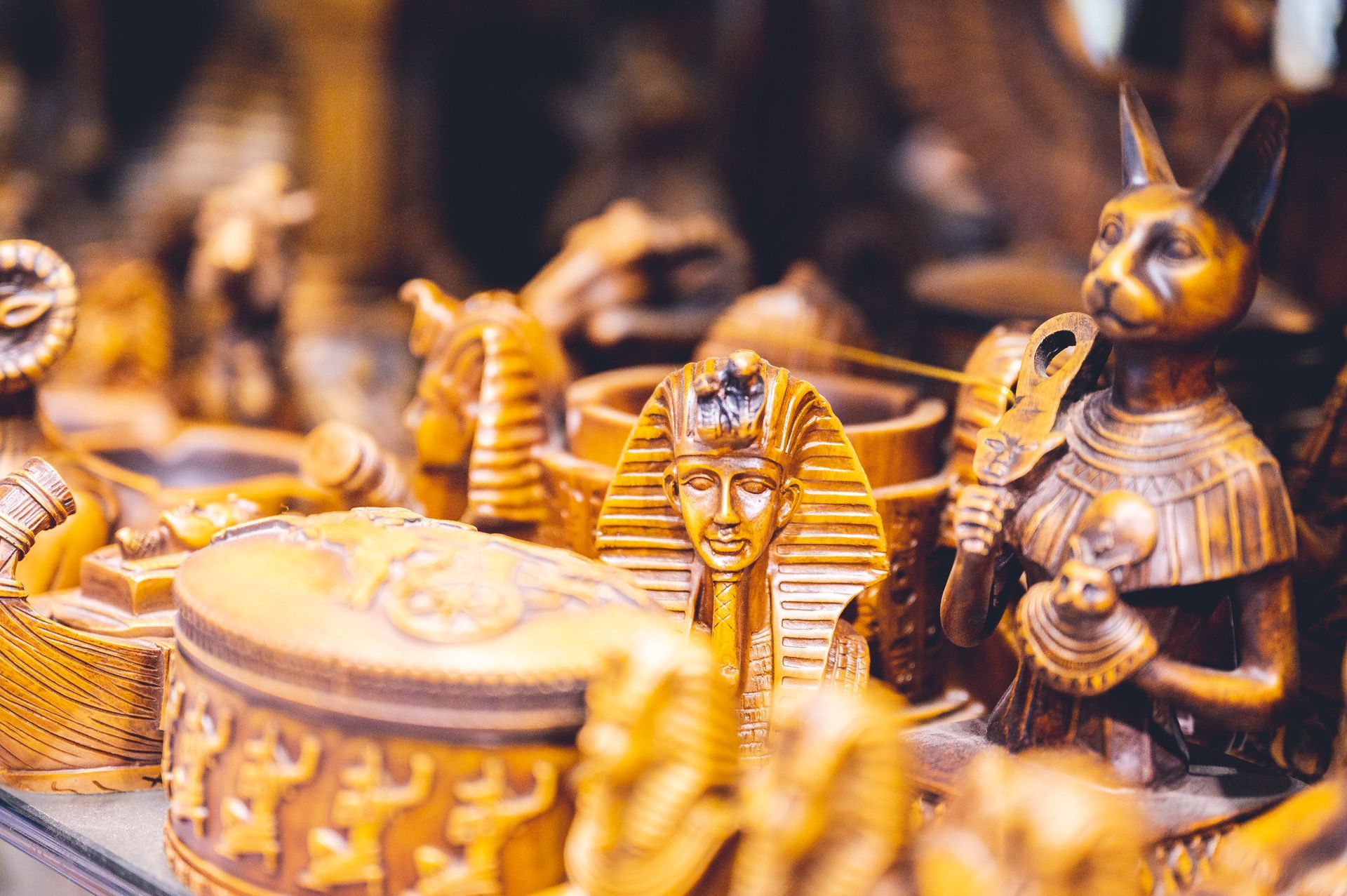 A close up of a bunch of statues on a table.