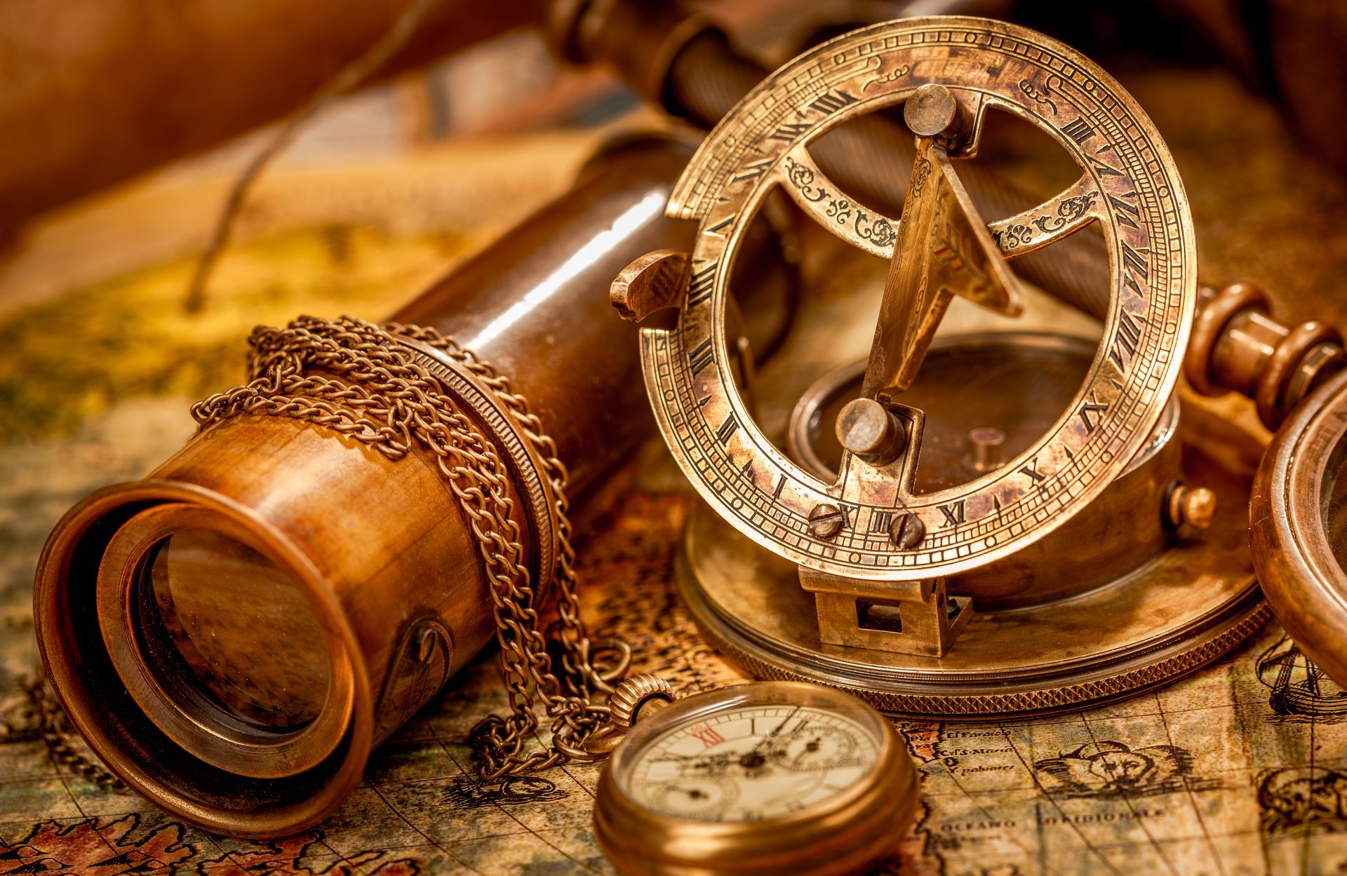 A compass and a telescope are on a map