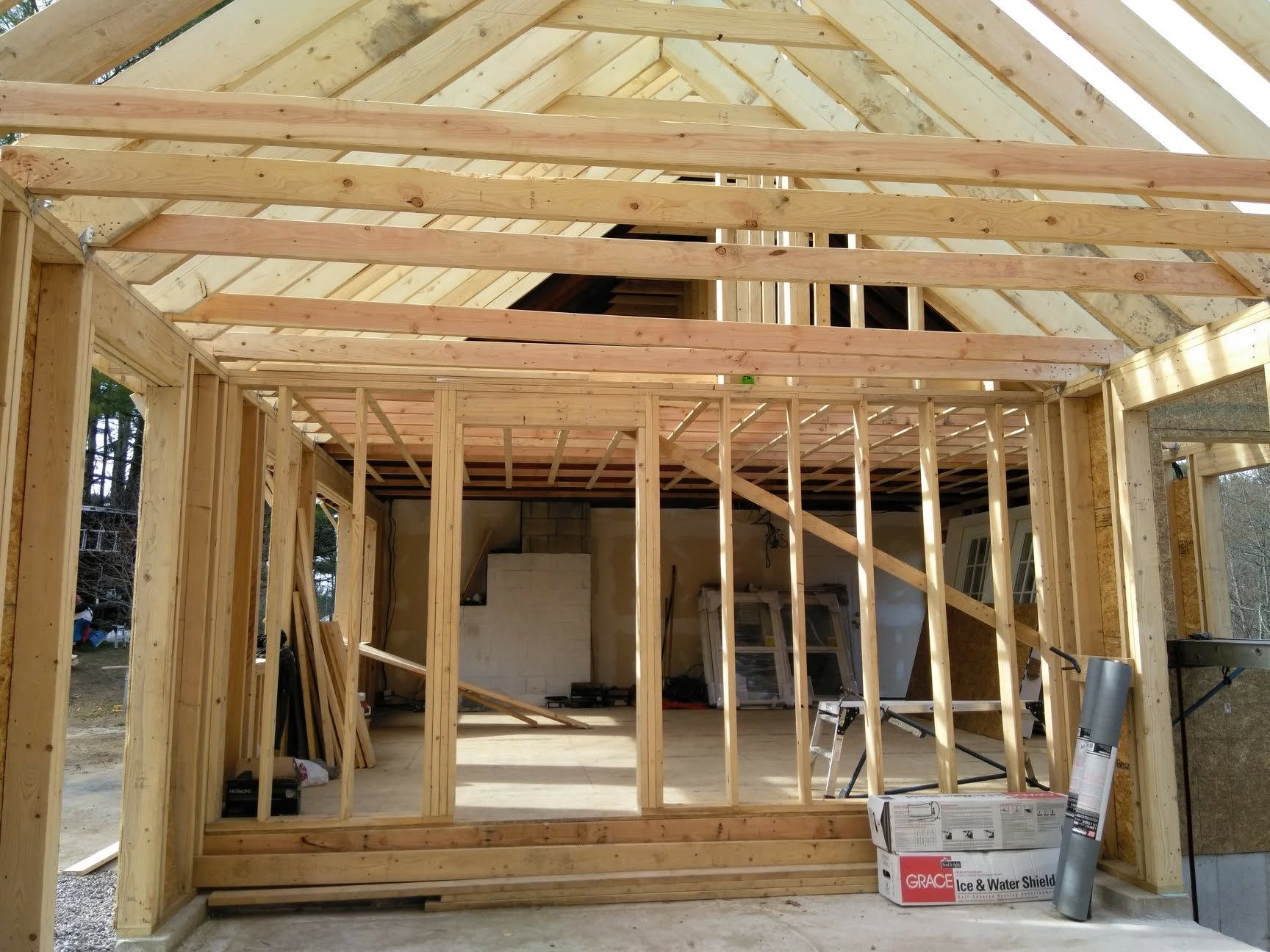 A wooden frame of a house under construction