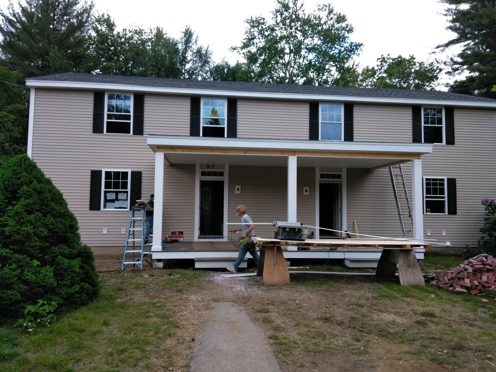 A house with a porch that is being built