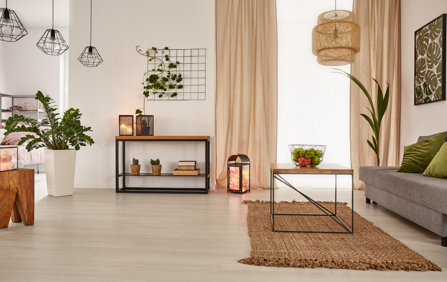 A living room with a couch , table , and rug.
