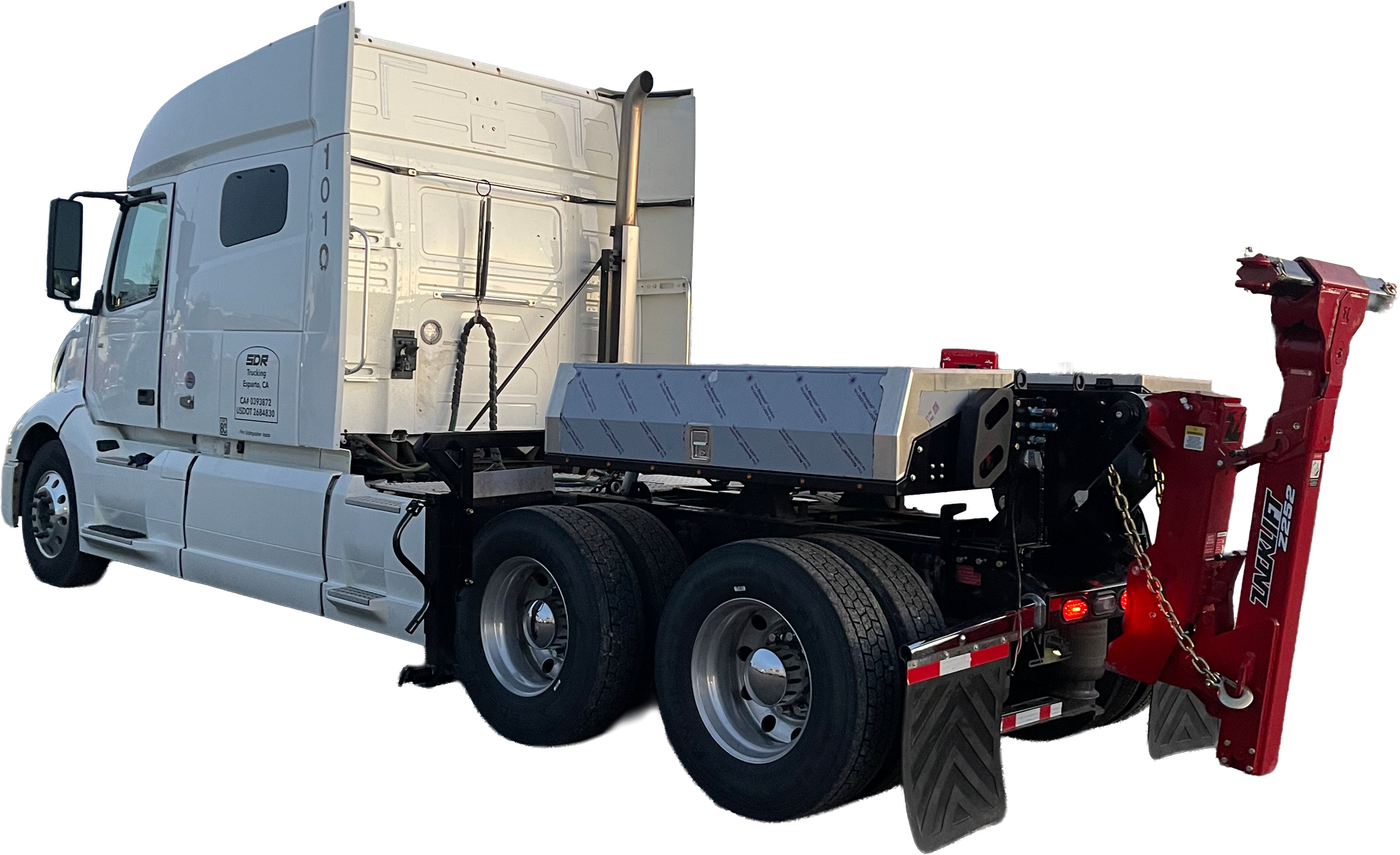 A semi truck with a tow hook attached to the back of it.