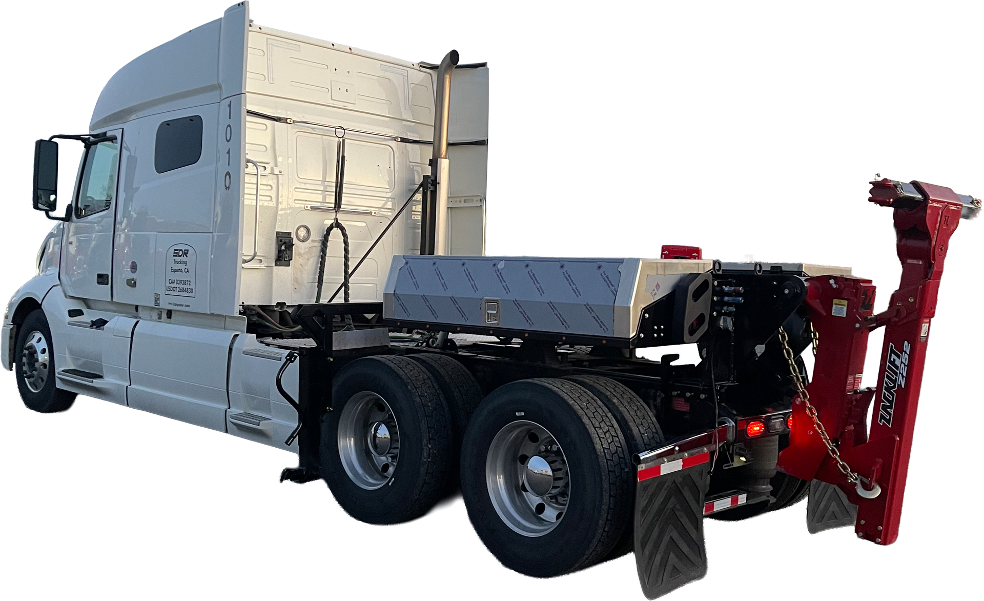 A semi truck with a tow hook attached to the back of it.