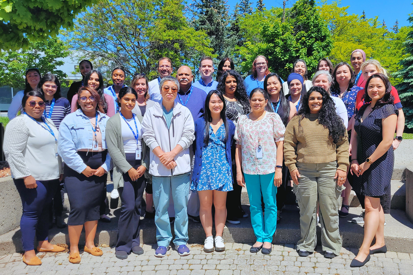 A large group of people are posing for a picture.