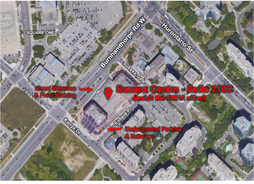 An aerial view of a hospital with a red arrow pointing to it
