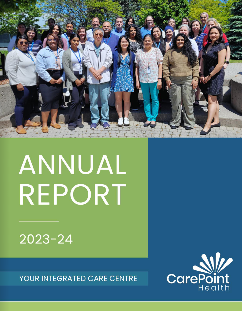 A group of people are posing for a picture on the cover of an annual report.