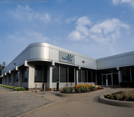 A large building with a sign on the side that says concepts