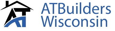 Logo of ATBuilders Wisconsin. The logo features an "AT" design with a house on top, and blue text.