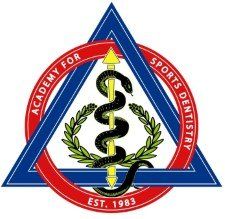 The logo for the academy for sports dentistry is a triangle with a snake on it.