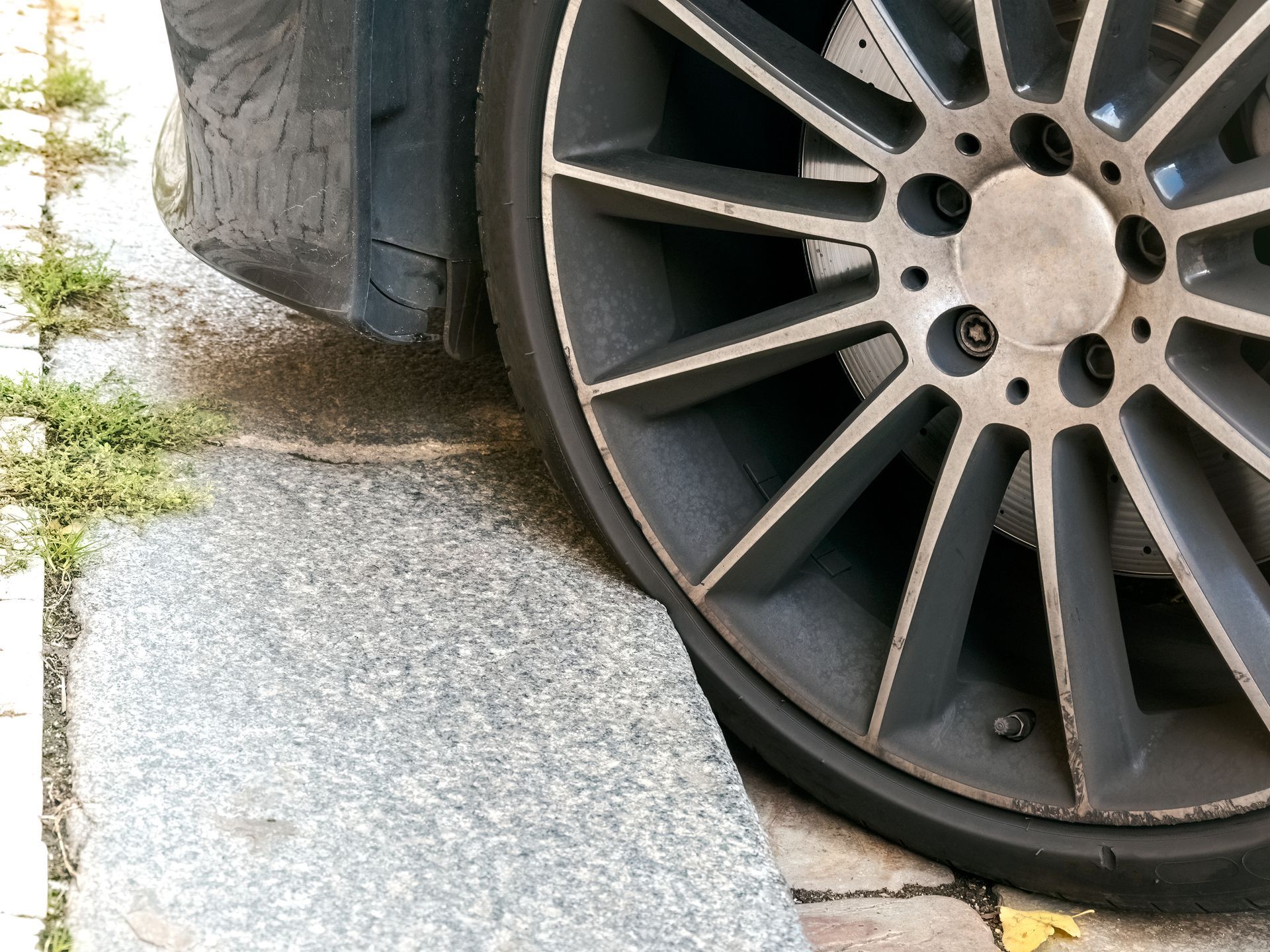 The Hidden Dangers of Curb Strikes and How to Get Back on Track | Crowell Brothers Automotive Inc.