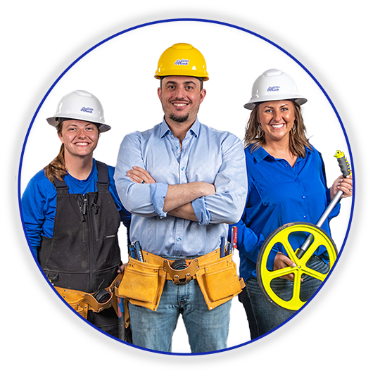 A group of construction workers are posing for a picture