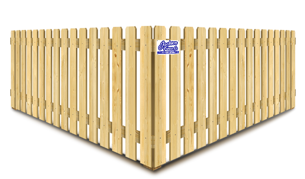 A wooden fence with a blue sticker on it