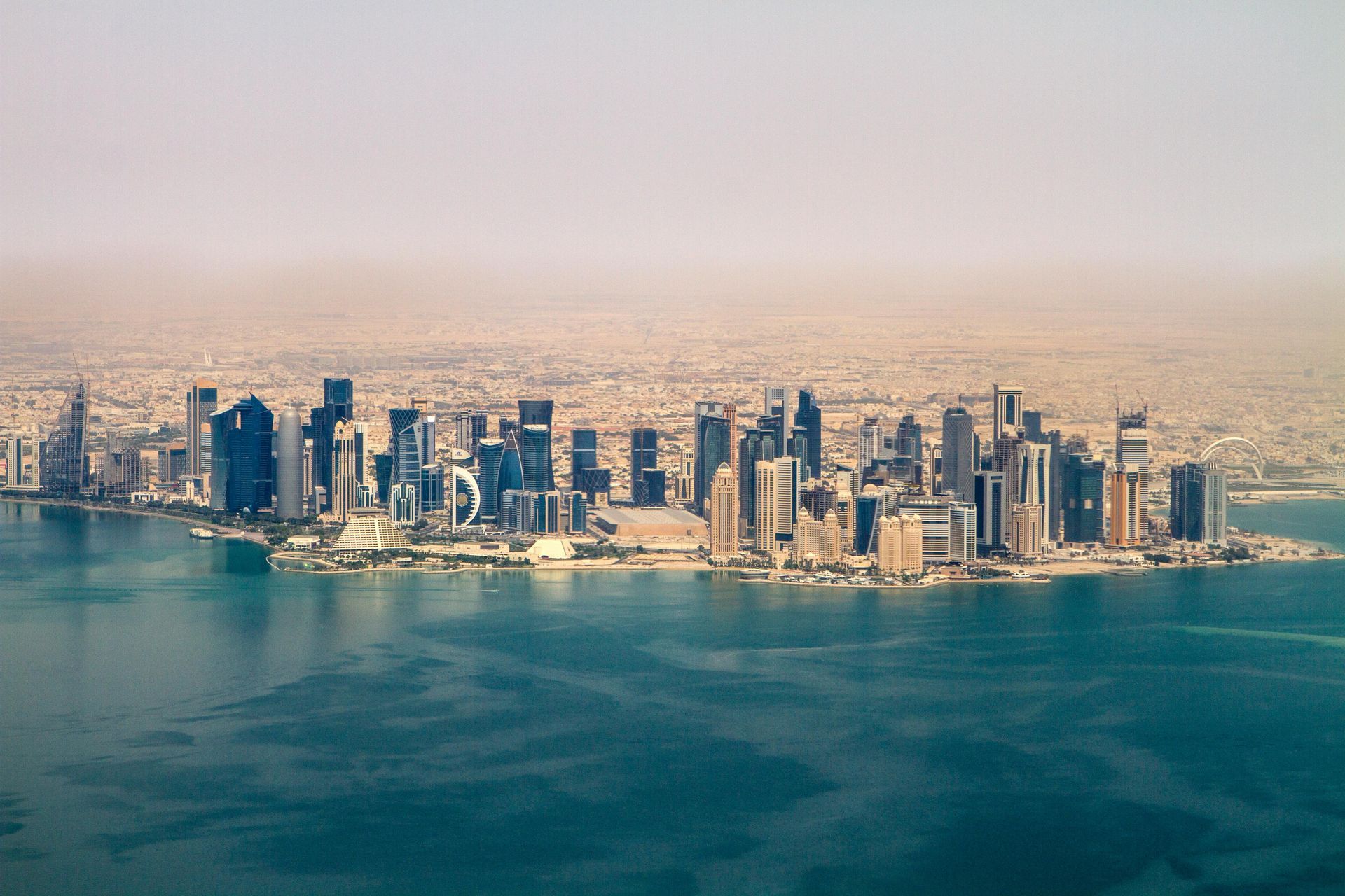 Qatar flag with white border.