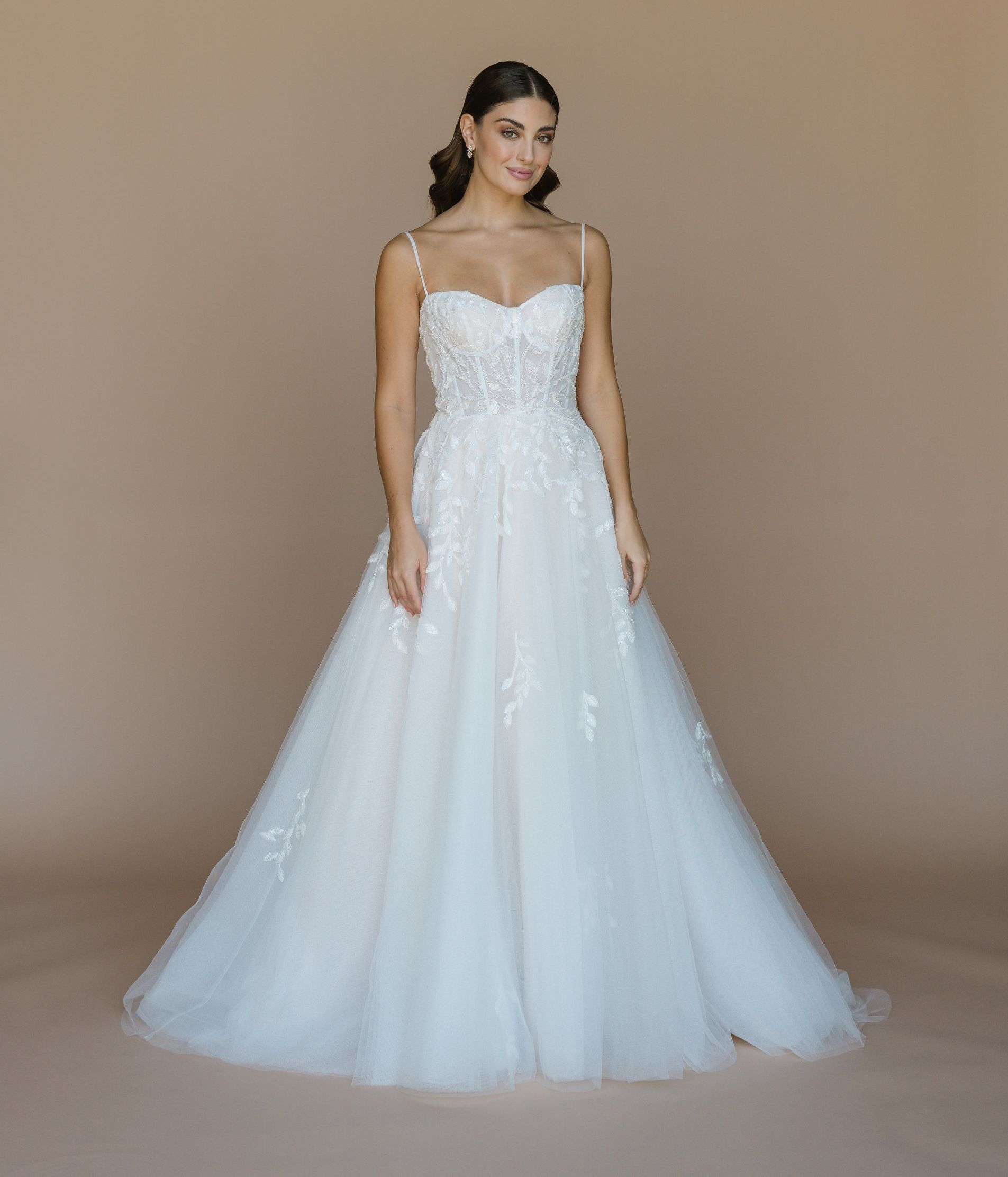 beaded leaf appliqued a-line wedding dress.