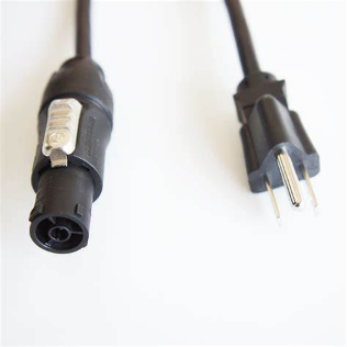 A close up of a power cord with a plug on it
