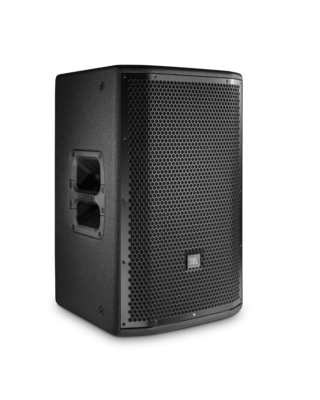 A black speaker is sitting on a white surface.