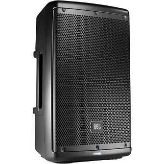 A black jbl speaker is sitting on a white surface.