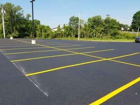 Commercial Asphalt Repairs — Parking Lot After Paving  in Syracuse, NY