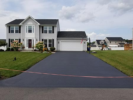 Asphalt Repairs — Driveway Parking Lot After in Syracuse, NY