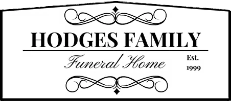 Hodges Family Funeral Home sign, black and white, ornate scrollwork, 