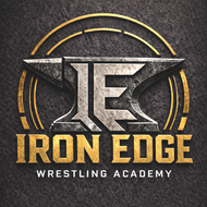 Iron Edge Wrestling Academy logo with gold and silver lettering on a dark textured background