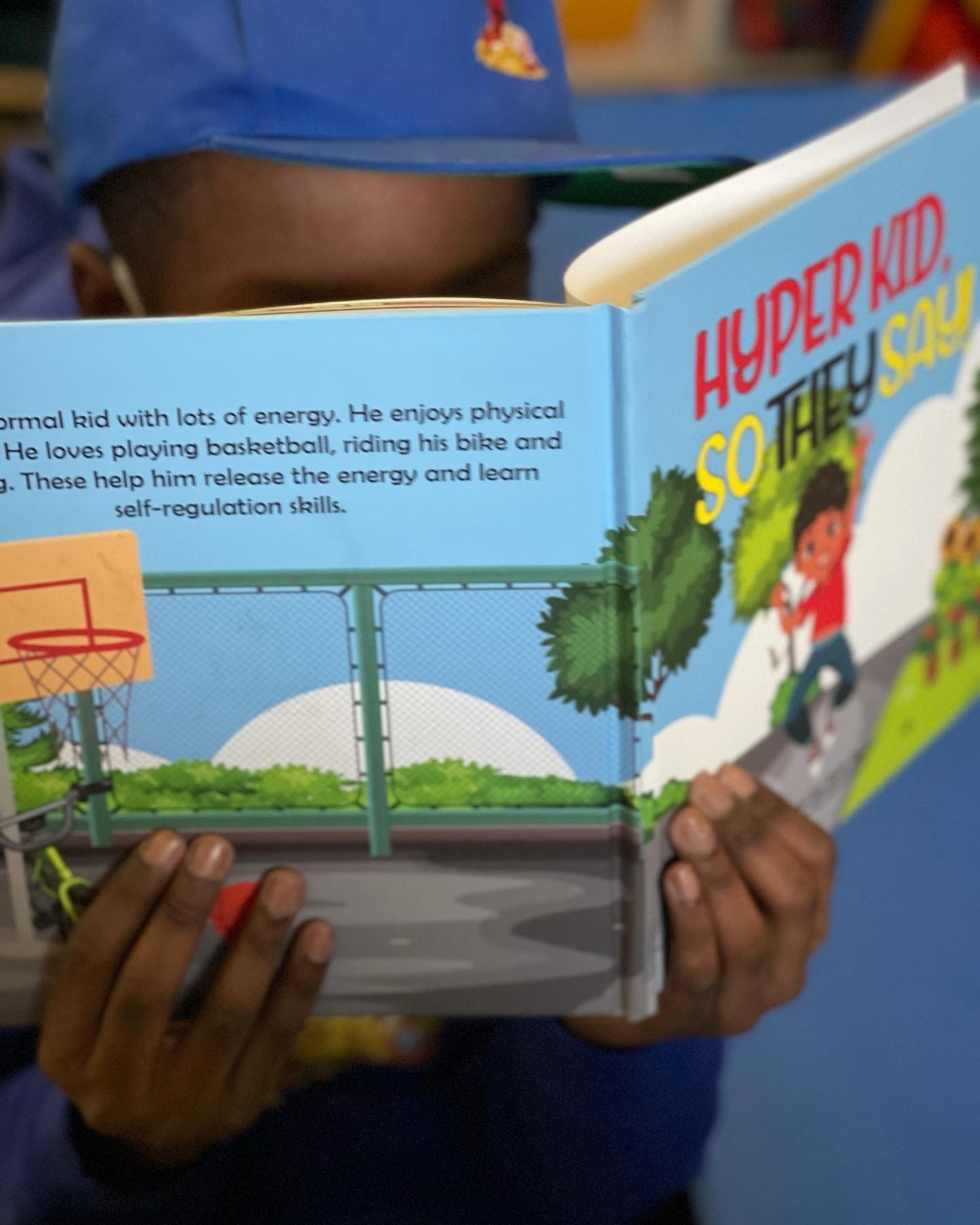 A person reading a book titled