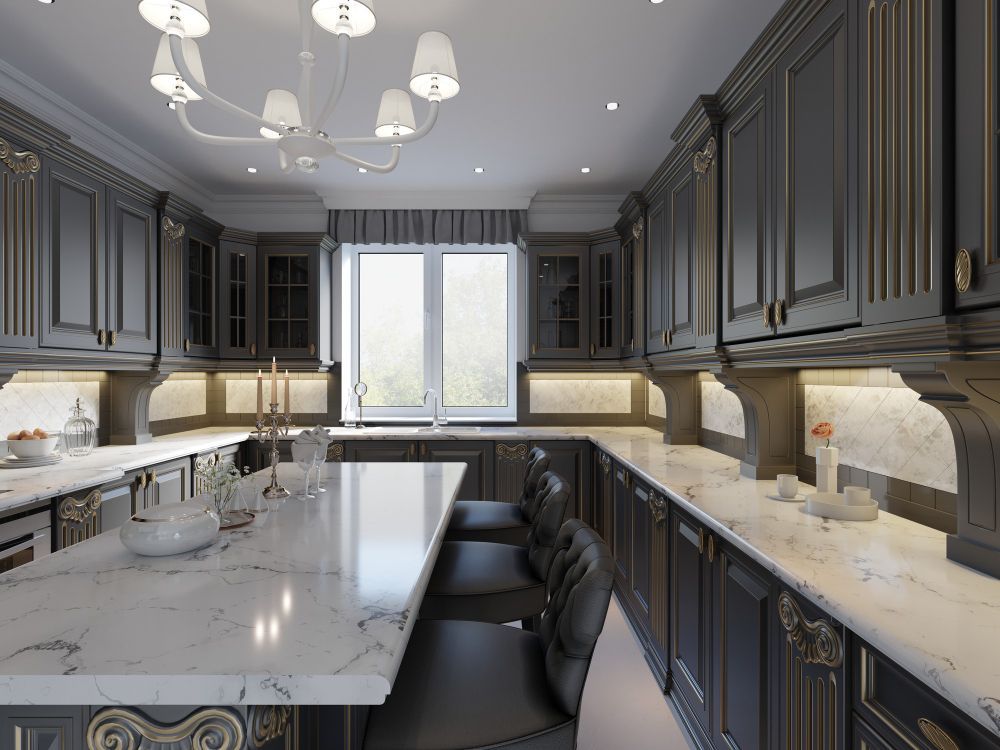 Kitchen with black cabinets, white counter tops, and a large island in Union City CA kitchen remodel.