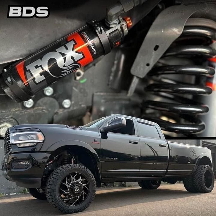 A Black Truck With A Fox Shock On It — All Automotive Services In Bundaberg East, QLD