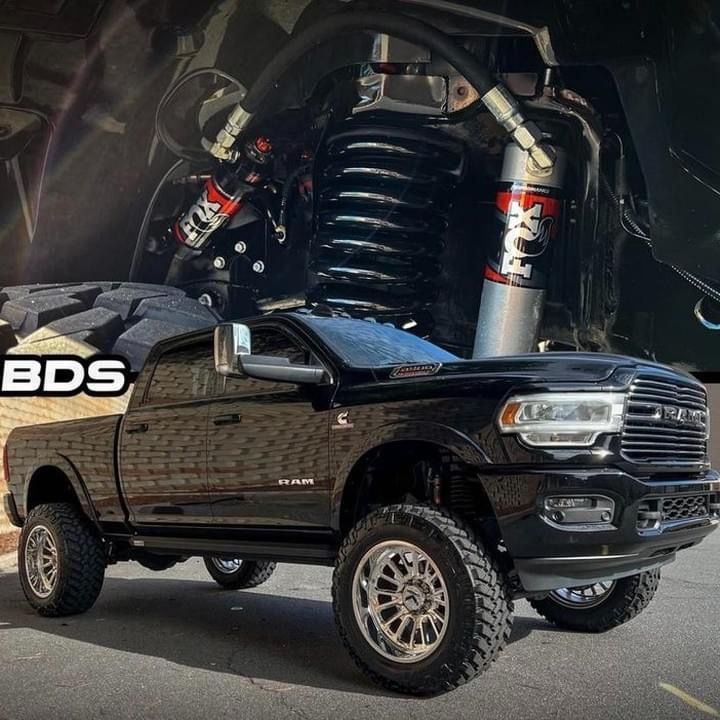 A Black Truck Is Parked In Front Of A Bds Advertisement — All Automotive Services In Bundaberg East, QLD